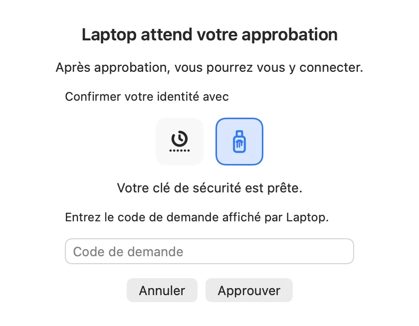 Fenêtre d'approbation d'un ordinateur en attente avec les icônes d'app d'authentification et de clé de sécurité, clé choisie, et champ du code de demande.