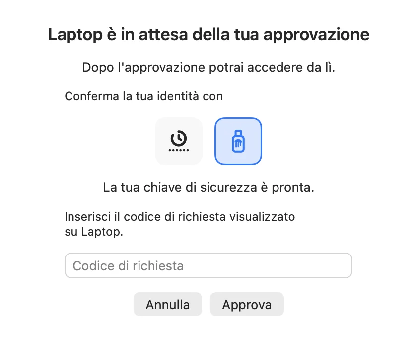 Finestra di approvazione per un computer in attesa con le icone di app di autenticazione e chiave di sicurezza, chiave selezionata, e campo per il codice di richiesta.